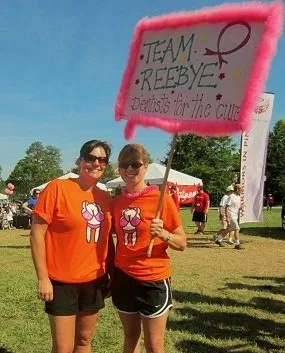 Community event at park, staff pair