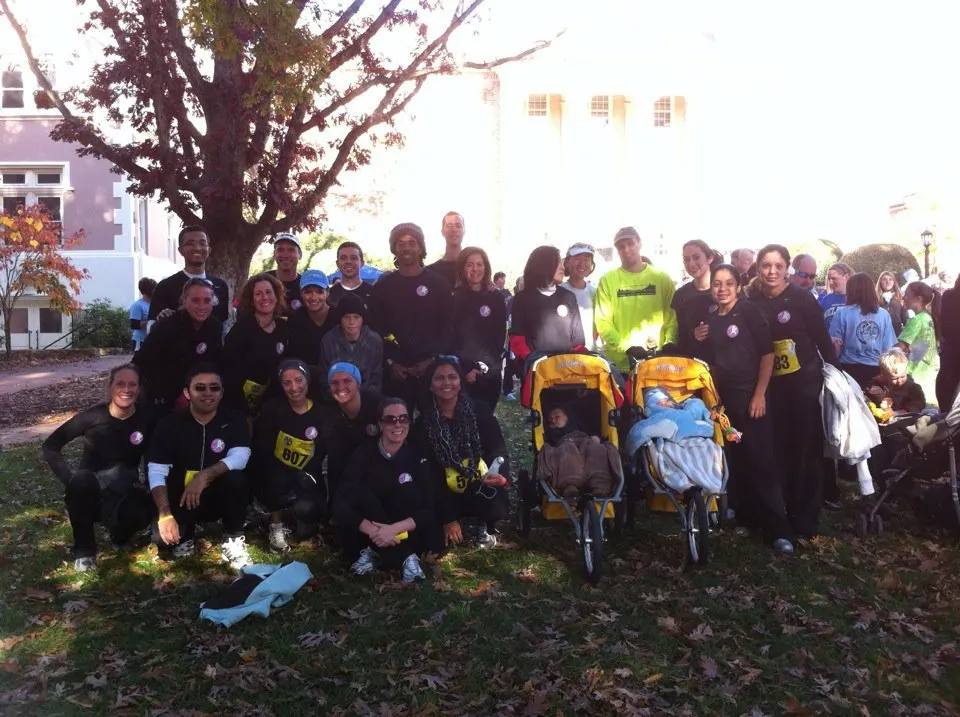 Full group photo outside at park event